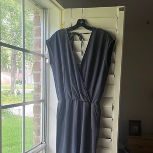 VILA SIZE SMALL Elegant Black Sleeveless Deep V Jumpsuit with Pockets